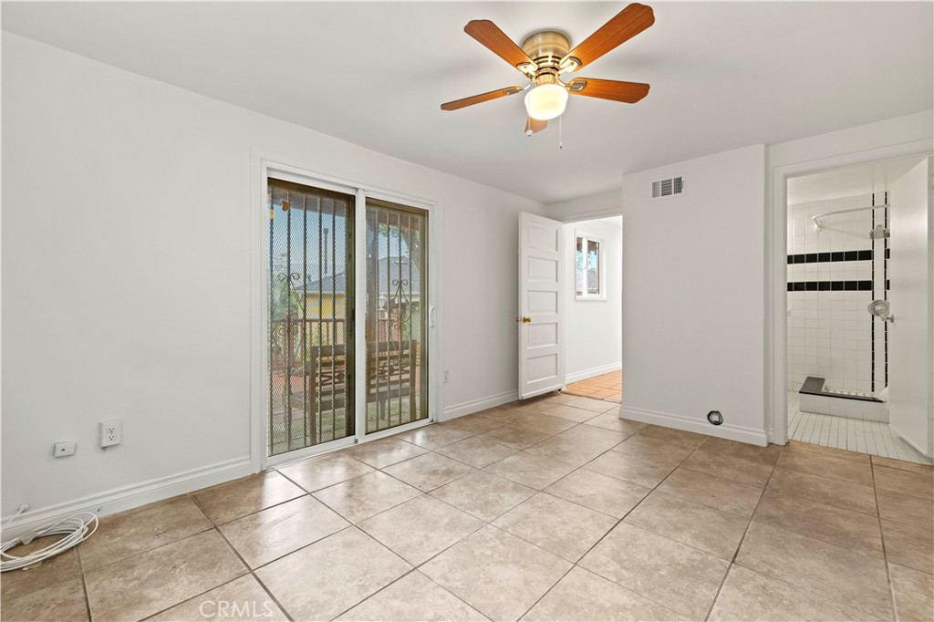 65 Grace Terrace Pasadena, CA 91105 - Photo 32 of 39 an empty room with closet and windows