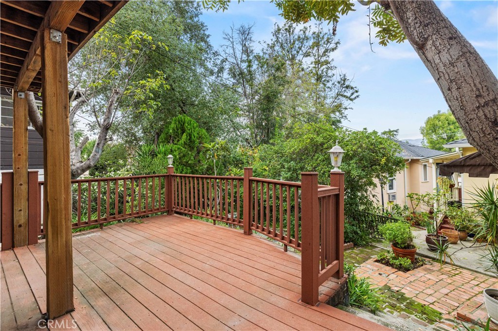65 Grace Terrace Pasadena, CA 91105 - Photo 35 of 39 a view of balcony with wooden floor and outdoor seating