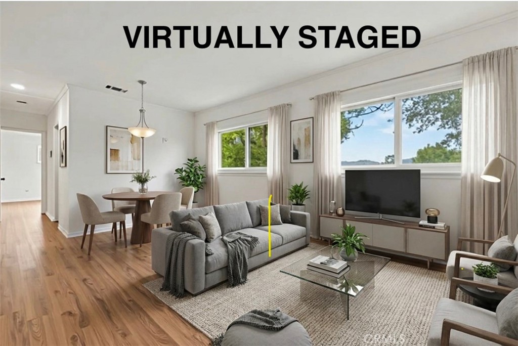 65 Grace Terrace Pasadena, CA 91105 - Photo 5 of 39 a living room with furniture and a flat screen tv