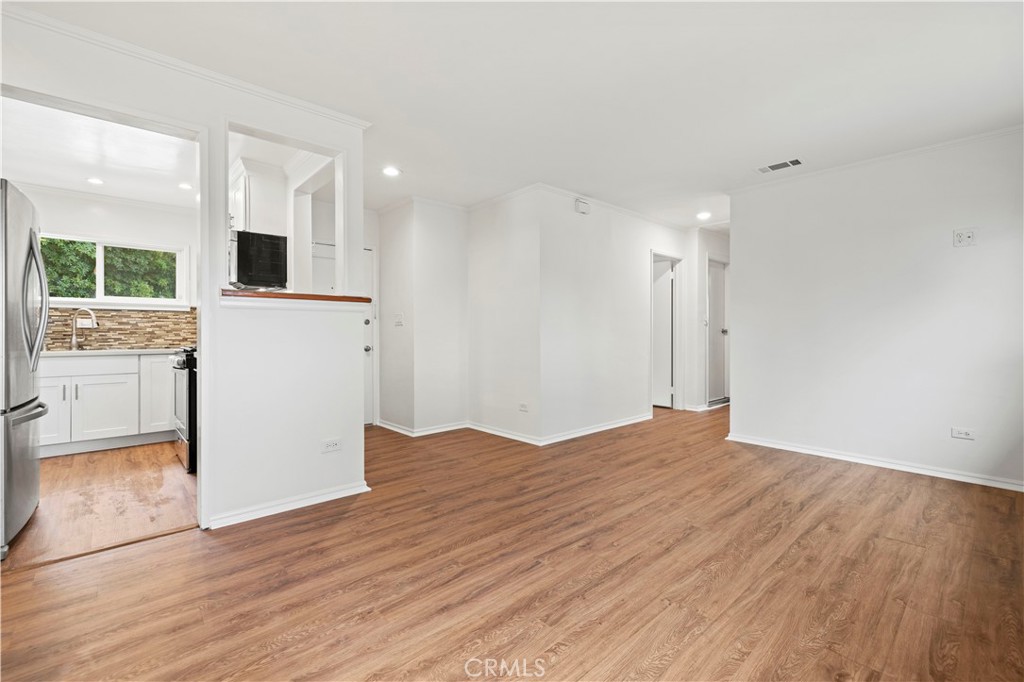 65 Grace Terrace Pasadena, CA 91105 - Photo 10 of 39 a view of kitchen with refrigerator and wooden floor