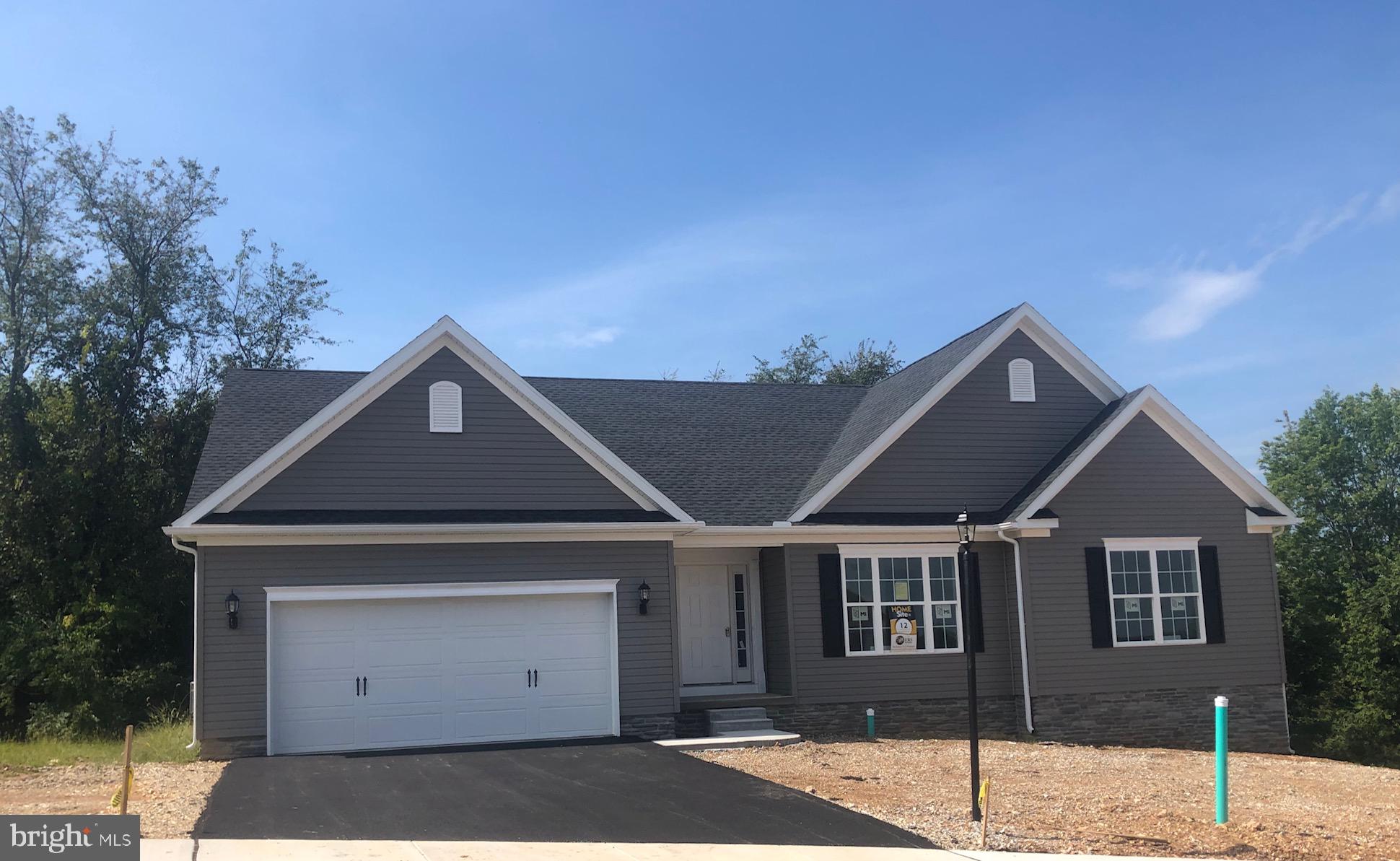 47 Huntmaster Drive Hanover, PA 17331 - Photo 2 of 22 a front view of a house with a garage
