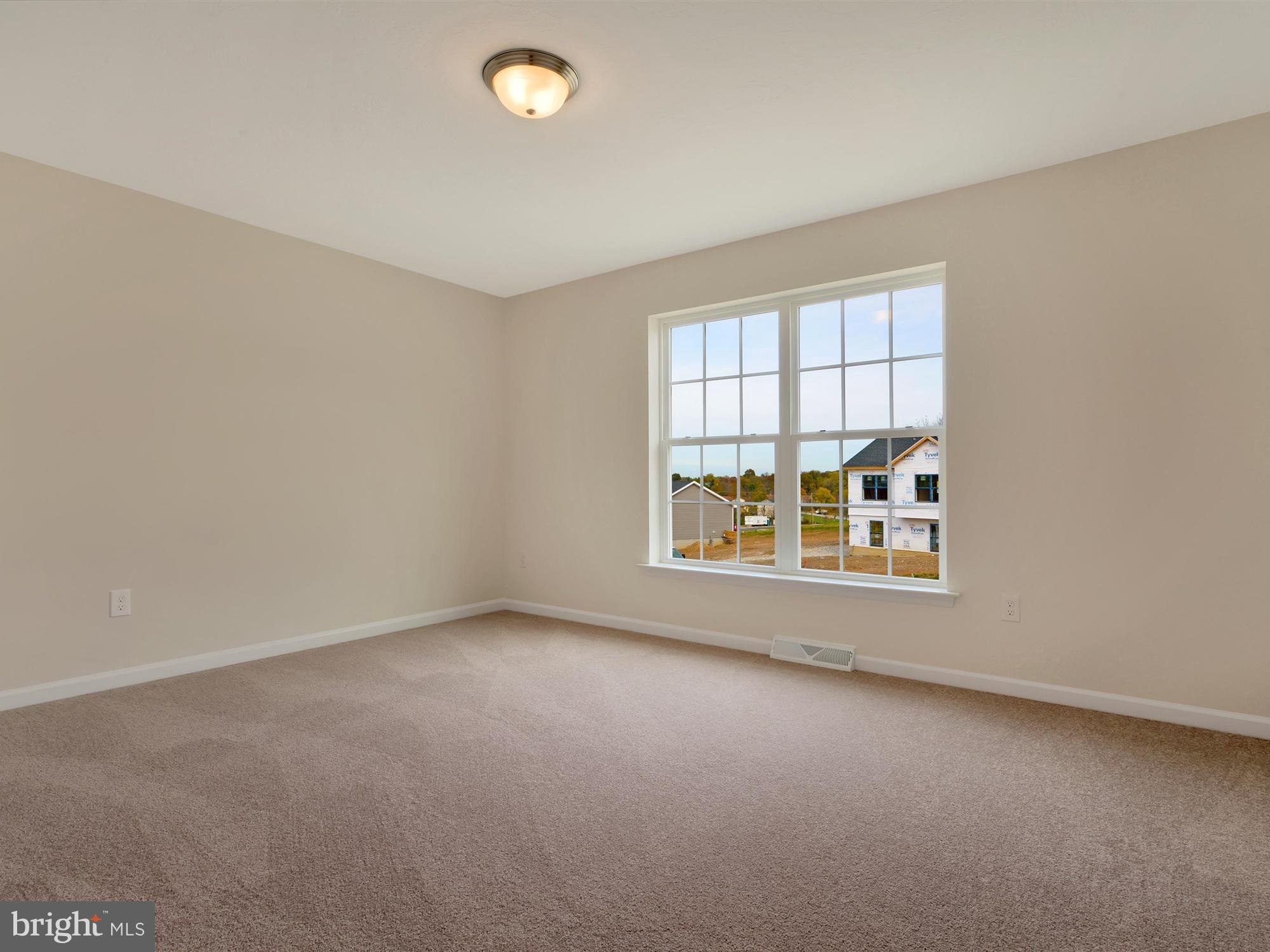 47 Huntmaster Drive Hanover, PA 17331 - Photo 18 of 22 an empty room with a window