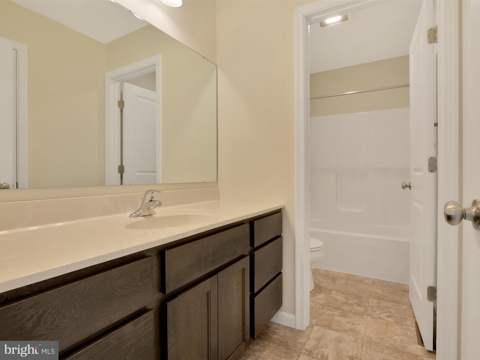 47 Huntmaster Drive Hanover, PA 17331 - Photo 19 of 22 a bathroom with a sink and a mirror