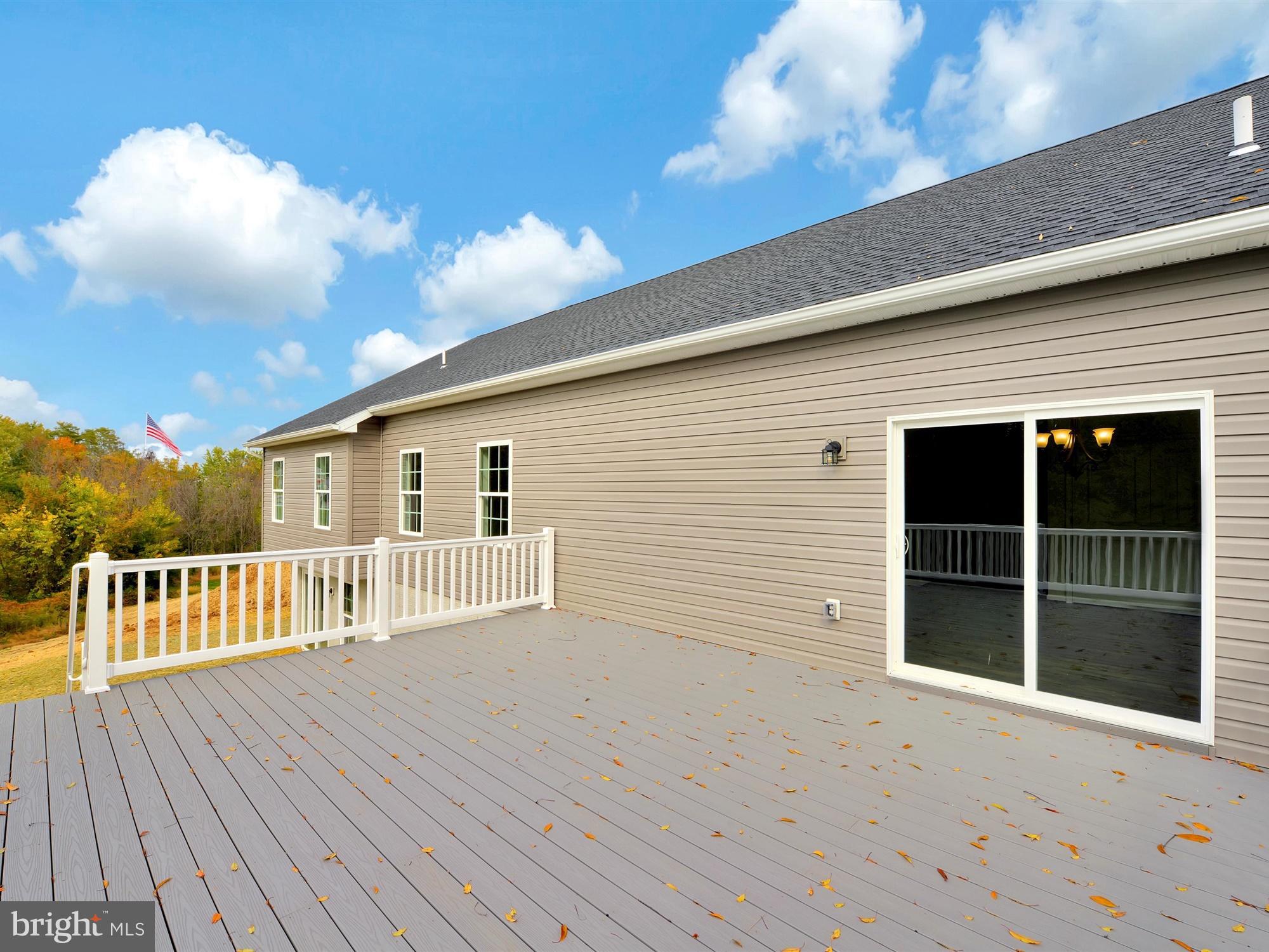 47 Huntmaster Drive Hanover, PA 17331 - Photo 22 of 22 a view of a house with wooden deck
