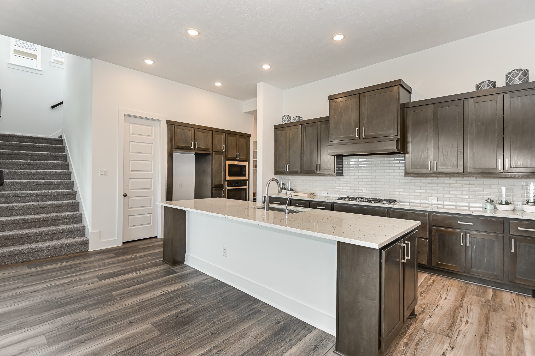 4847 Morning Spgs Drive Spring, TX 77386 - Photo 3 of 21 a kitchen with stainless steel appliances granite countertop a sink stove and refrigerator