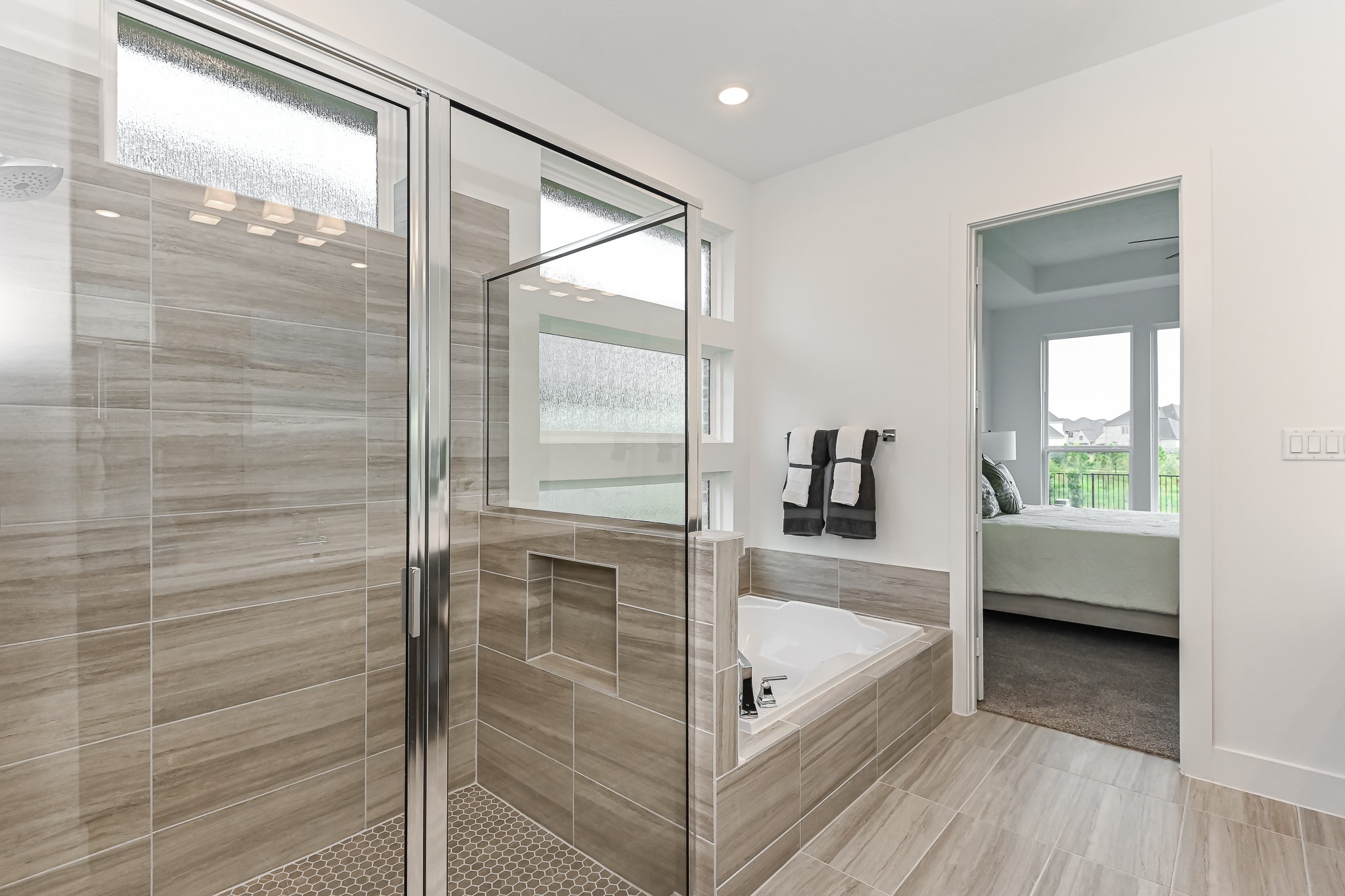 4847 Morning Spgs Drive Spring, TX 77386 - Photo 10 of 21 a bathroom with a tub and shower