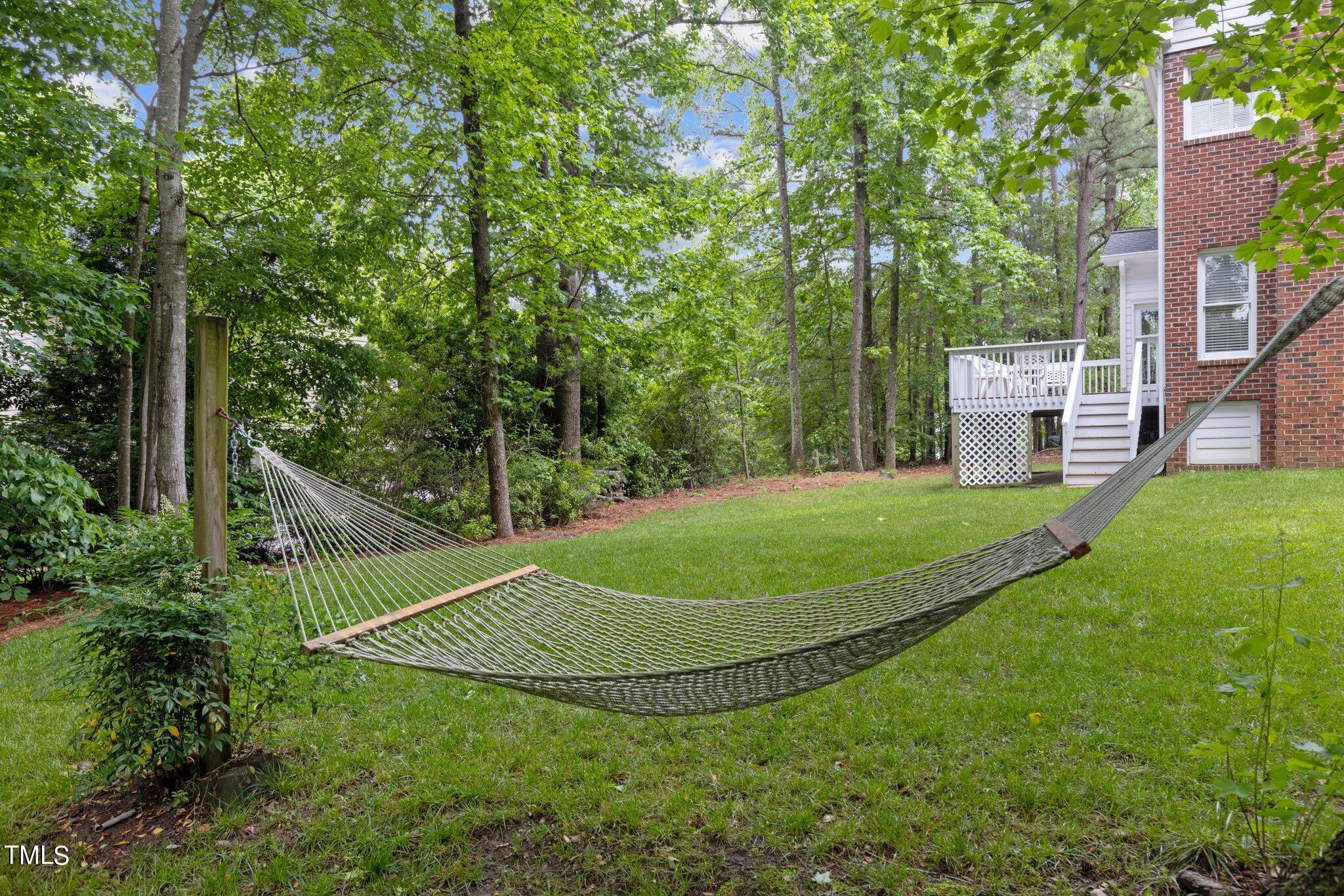 100 Shepton Drive Cary, NC 27519 - Photo 34 of 43 a view of a tennis court