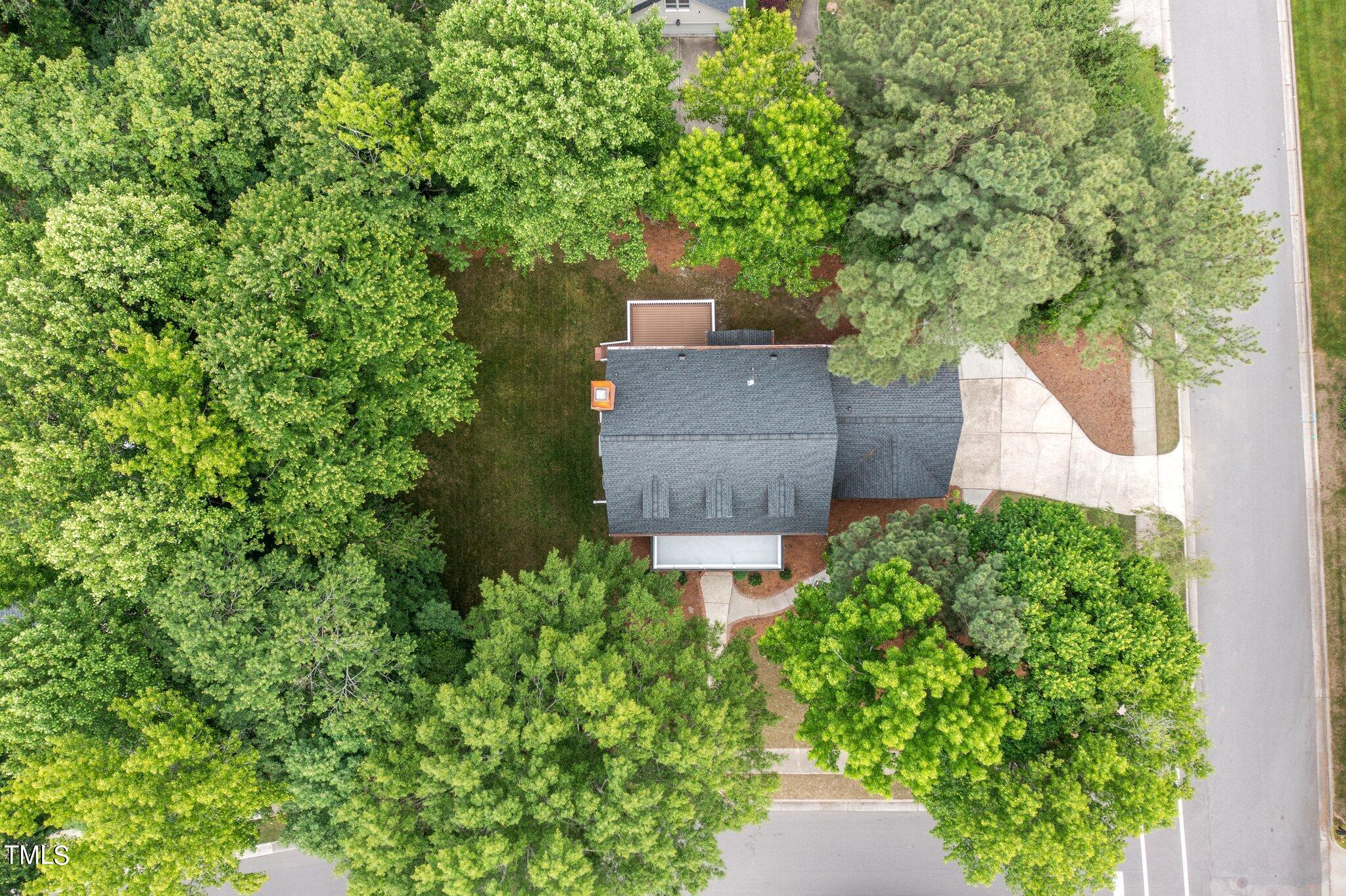 100 Shepton Drive Cary, NC 27519 - Photo 35 of 43 an aerial view of a house with a yard and garden