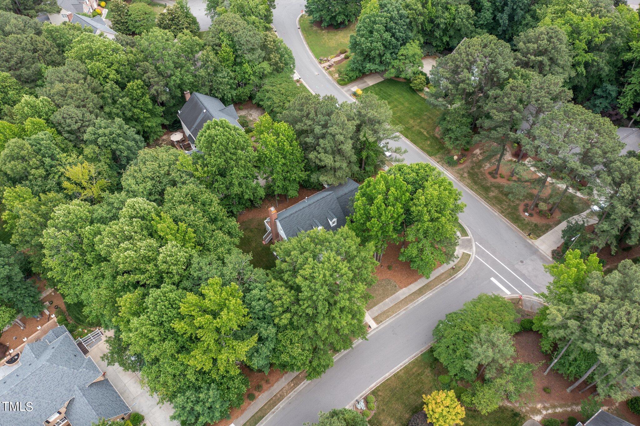 100 Shepton Drive Cary, NC 27519 - Photo 38 of 43 an aerial view of a house with a yard