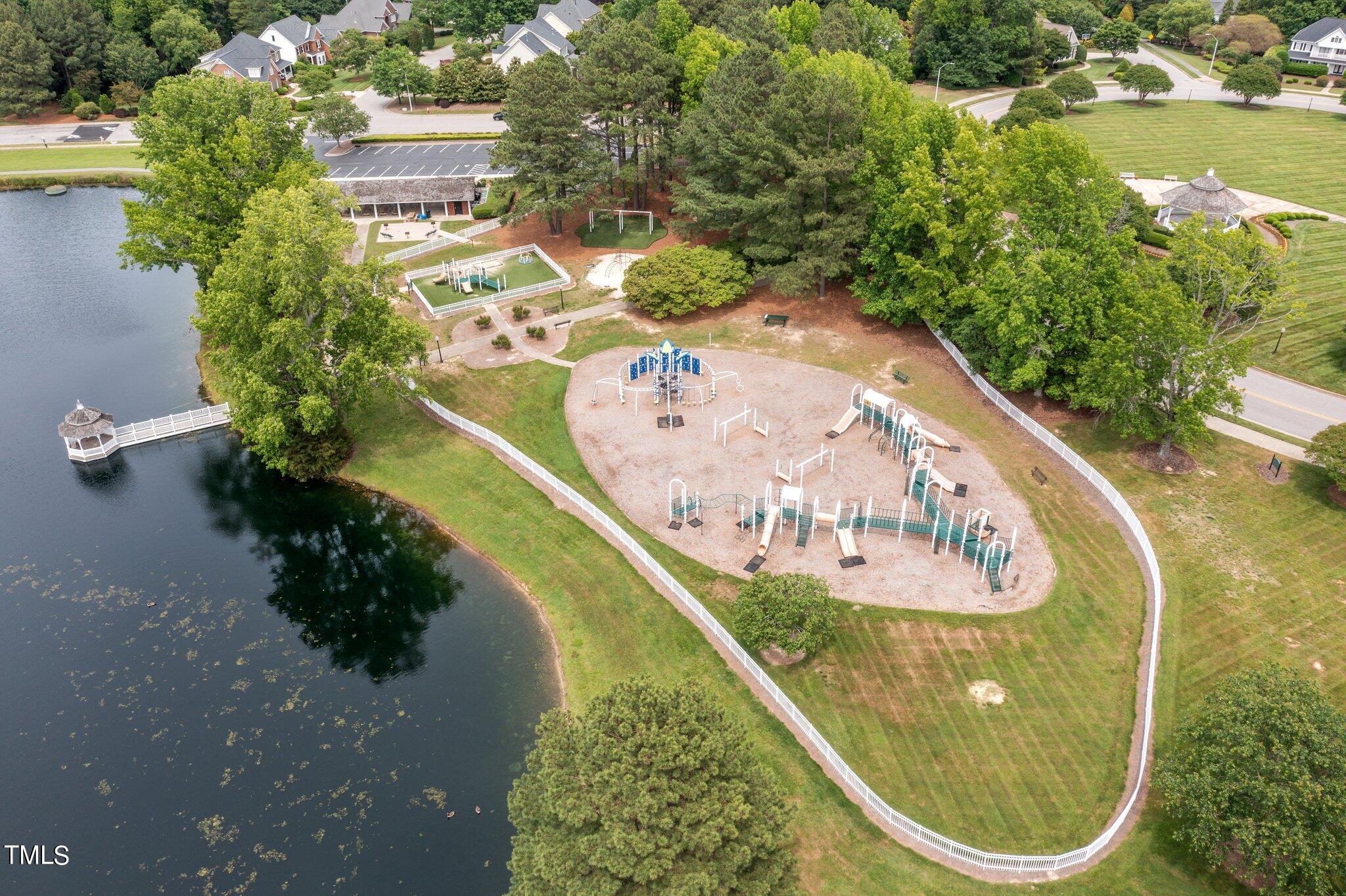 100 Shepton Drive Cary, NC 27519 - Photo 42 of 43 a view of swimming pool with a garden