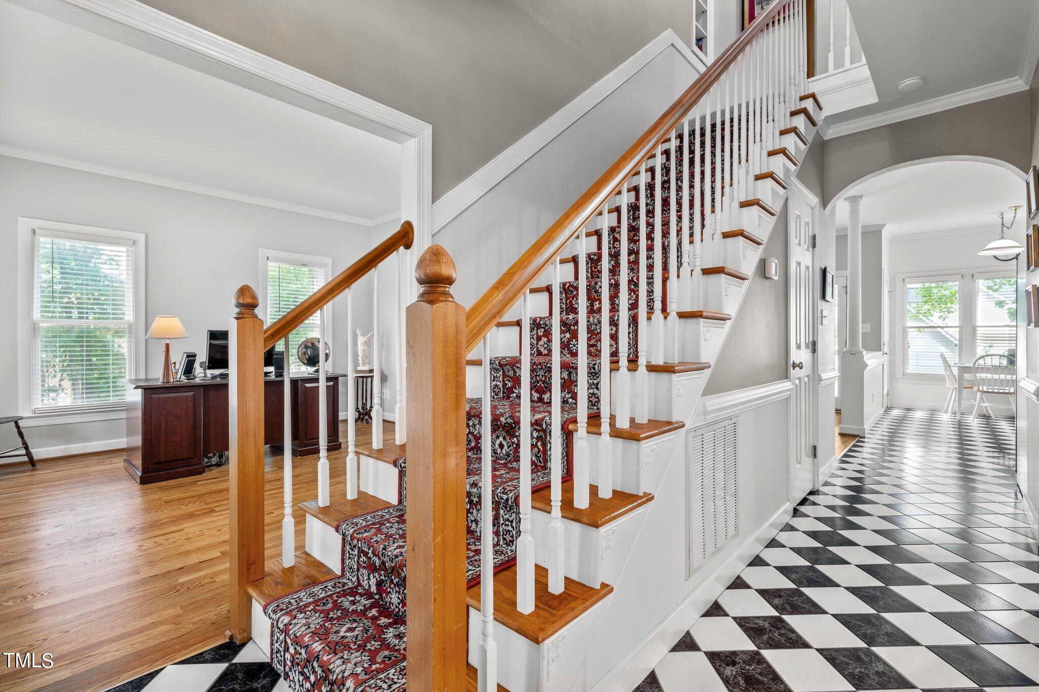 100 Shepton Drive Cary, NC 27519 - Photo 6 of 43 a view of entryway with wooden floor and stairs