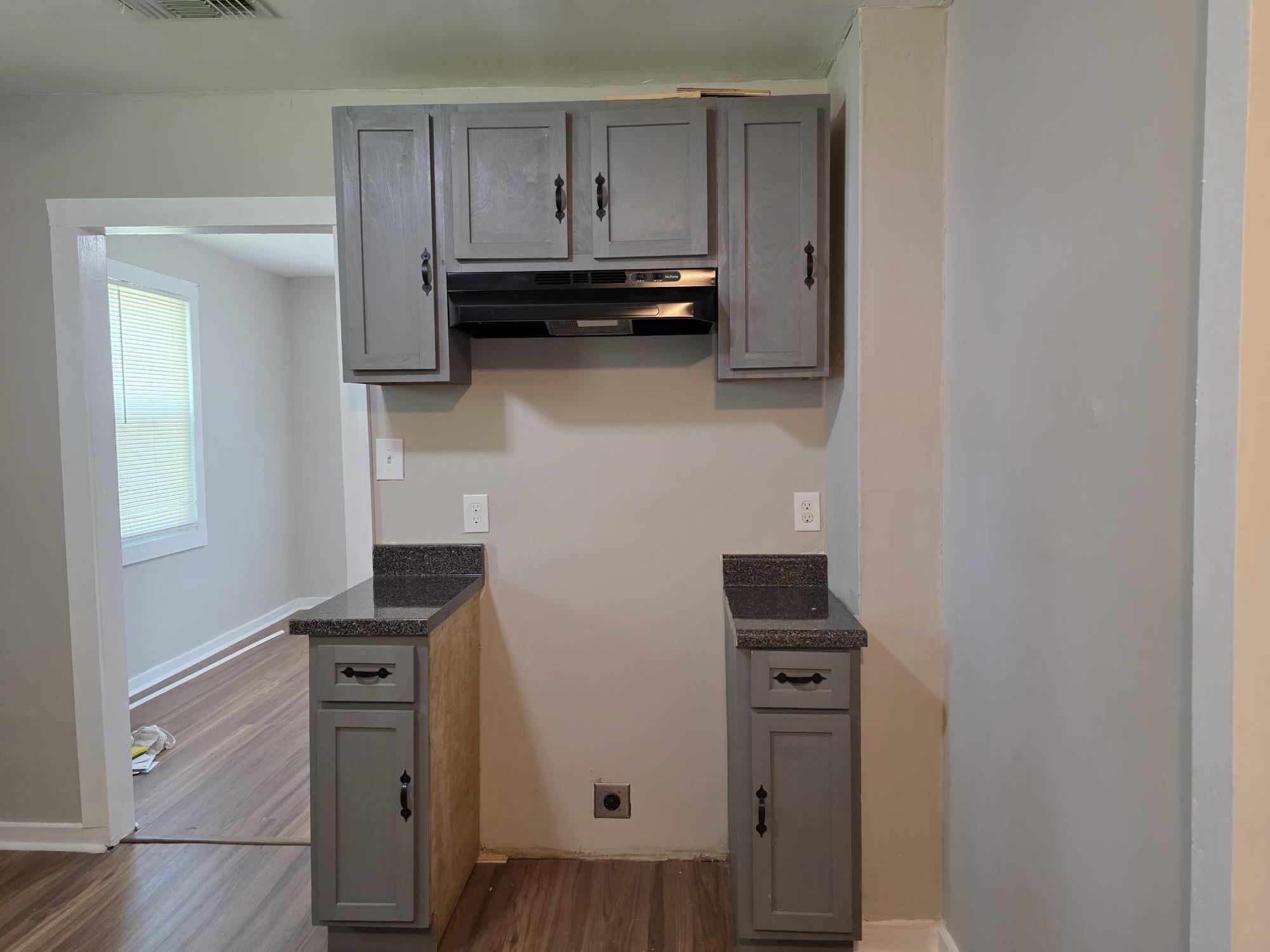 1319 Nicholas Street Memphis, TN 38107 - Photo 8 of 14 a view of kitchen and wooden floor