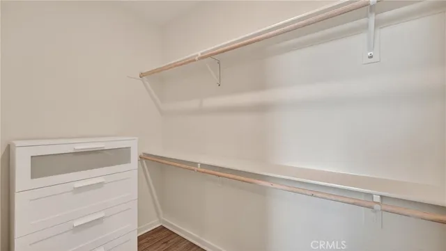 a view of an empty walk in closet