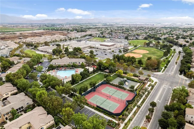 an aerial view of a house with outdoor space