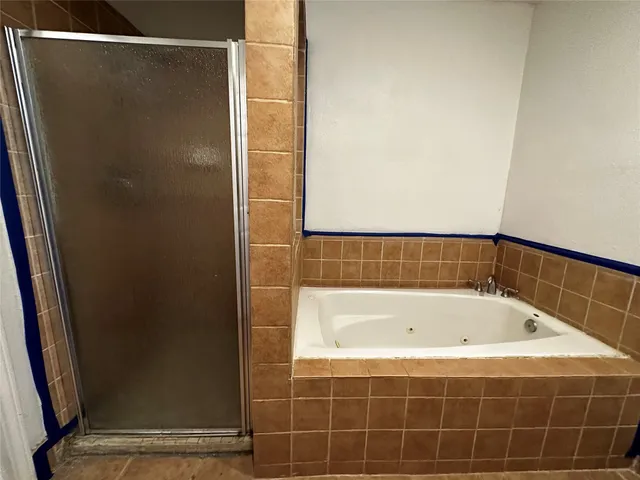 a bathroom with a bath tub