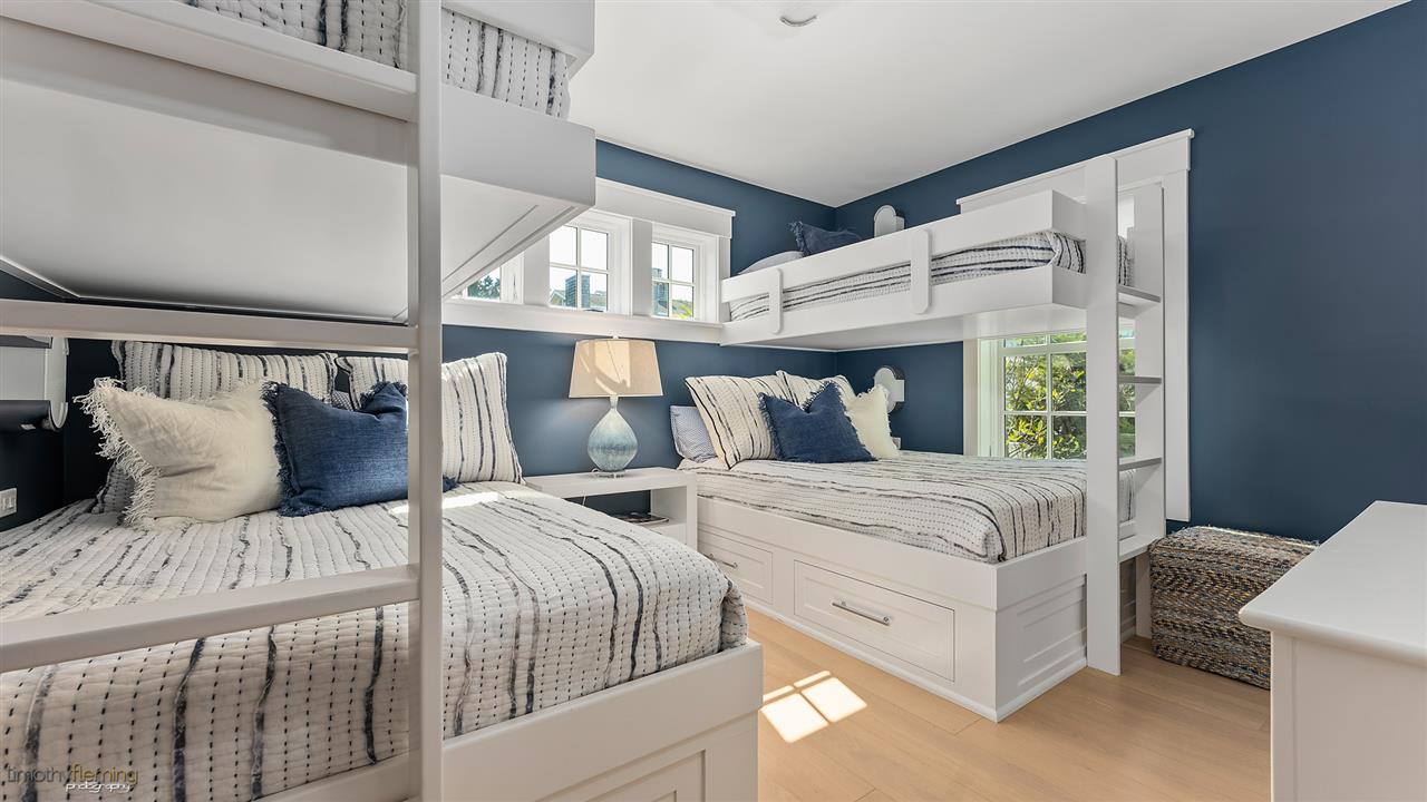 74 38th Street Avalon, NJ 08202 - Photo 13 of 39 a bedroom with double bed and a window