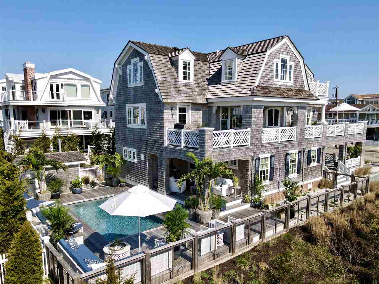 74 38th Street Avalon, NJ 08202 - Photo 35 of 39 a aerial view of a house with a yard and outdoor seating