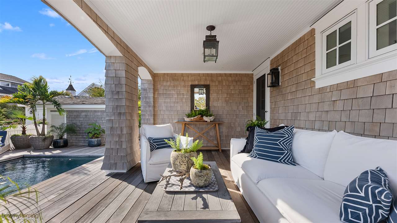 74 38th Street Avalon, NJ 08202 - Photo 36 of 39 a living room with furniture fireplace and a potted plant