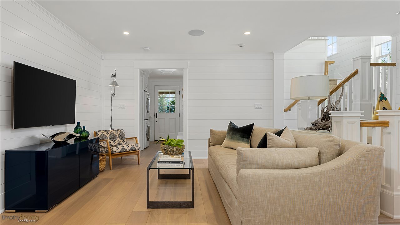 74 38th Street Avalon, NJ 08202 - Photo 9 of 39 a living room with furniture and a flat screen tv