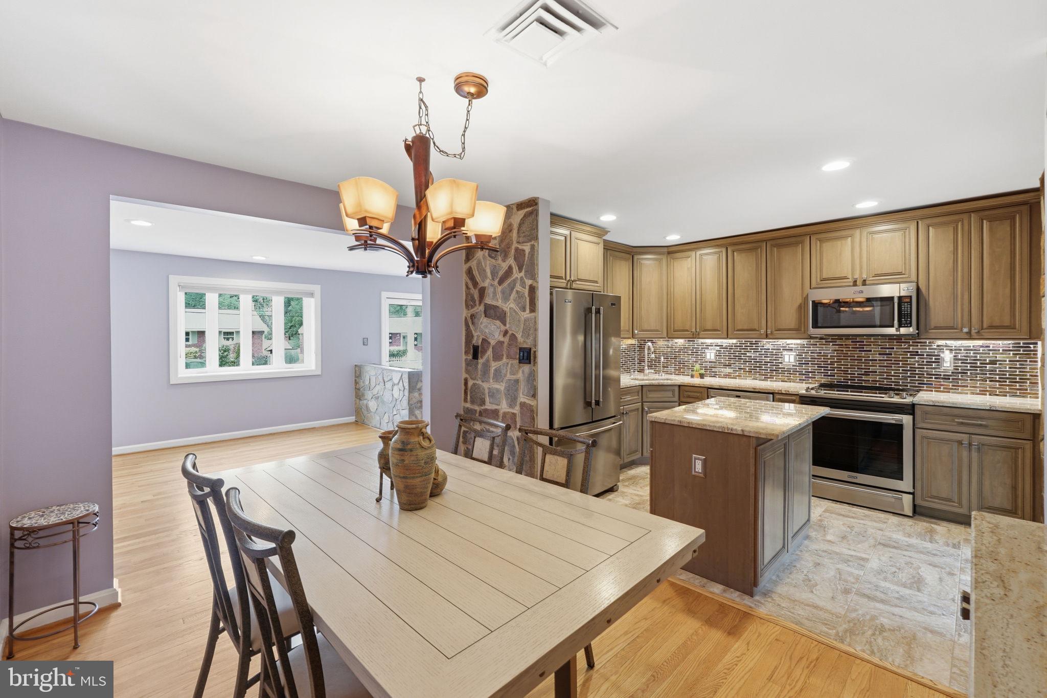 10713 Gregory Street Silver Spring, MD 20901 - Photo 8 of 38 Din Area Opens to Stunning Kit