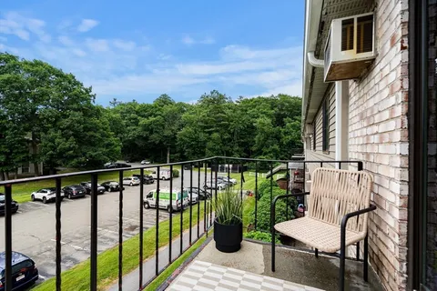 a balcony with chairs