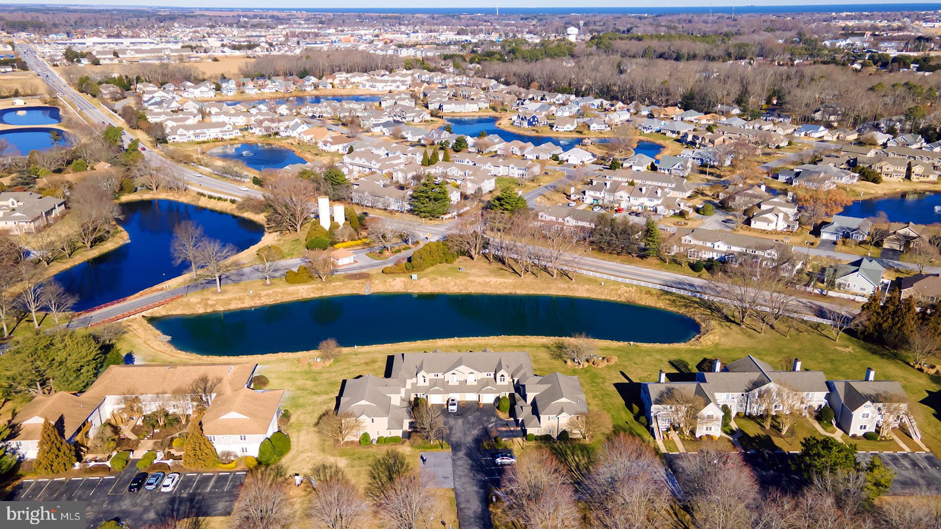 18484 Drayton Hall Road, Unit 8 Lewes, DE 19958 - Photo 26 of 28 Community with pond