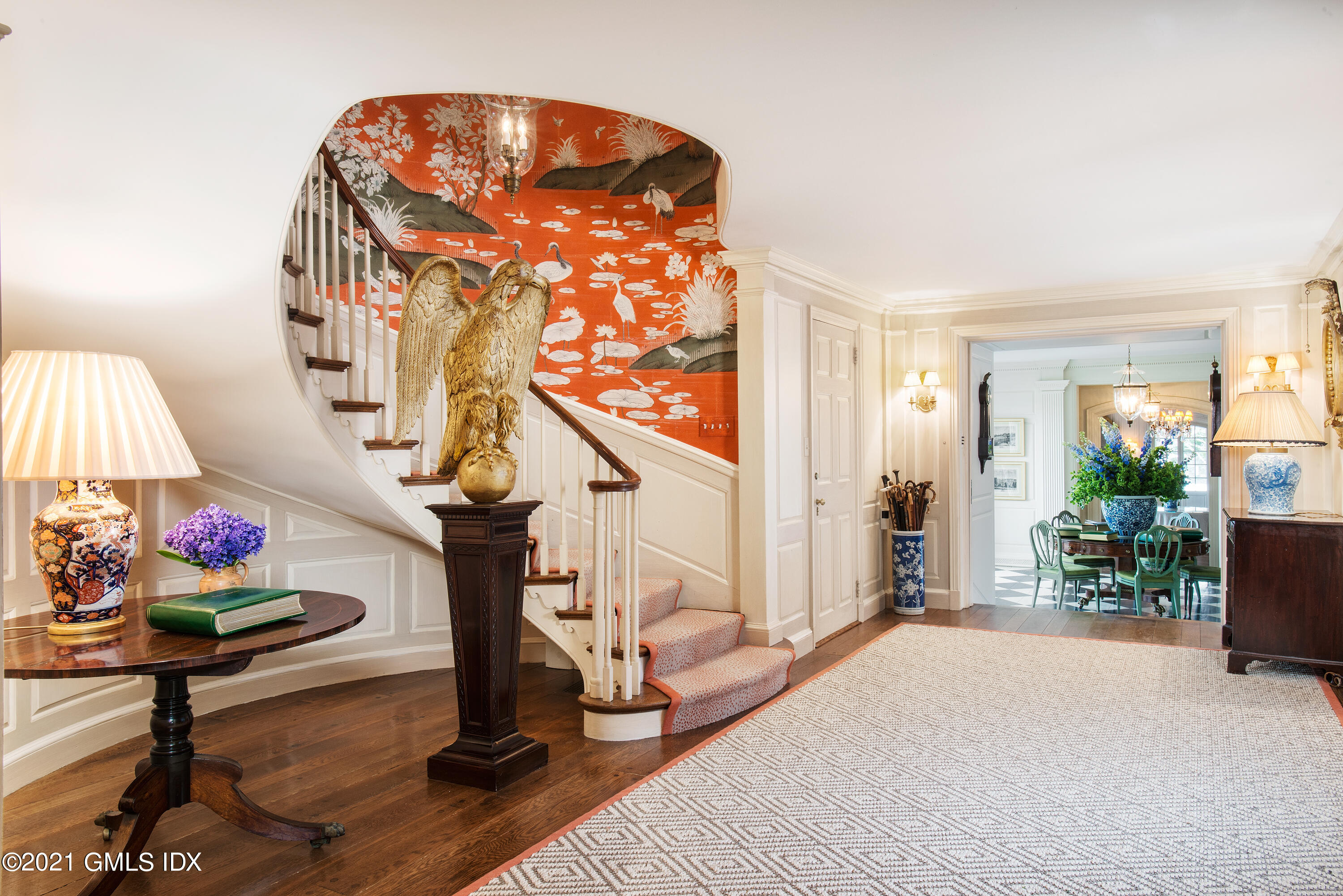 591 Riversville Road Greenwich, CT 06831 - Photo 12 of 79 a living room with furniture and a chandelier