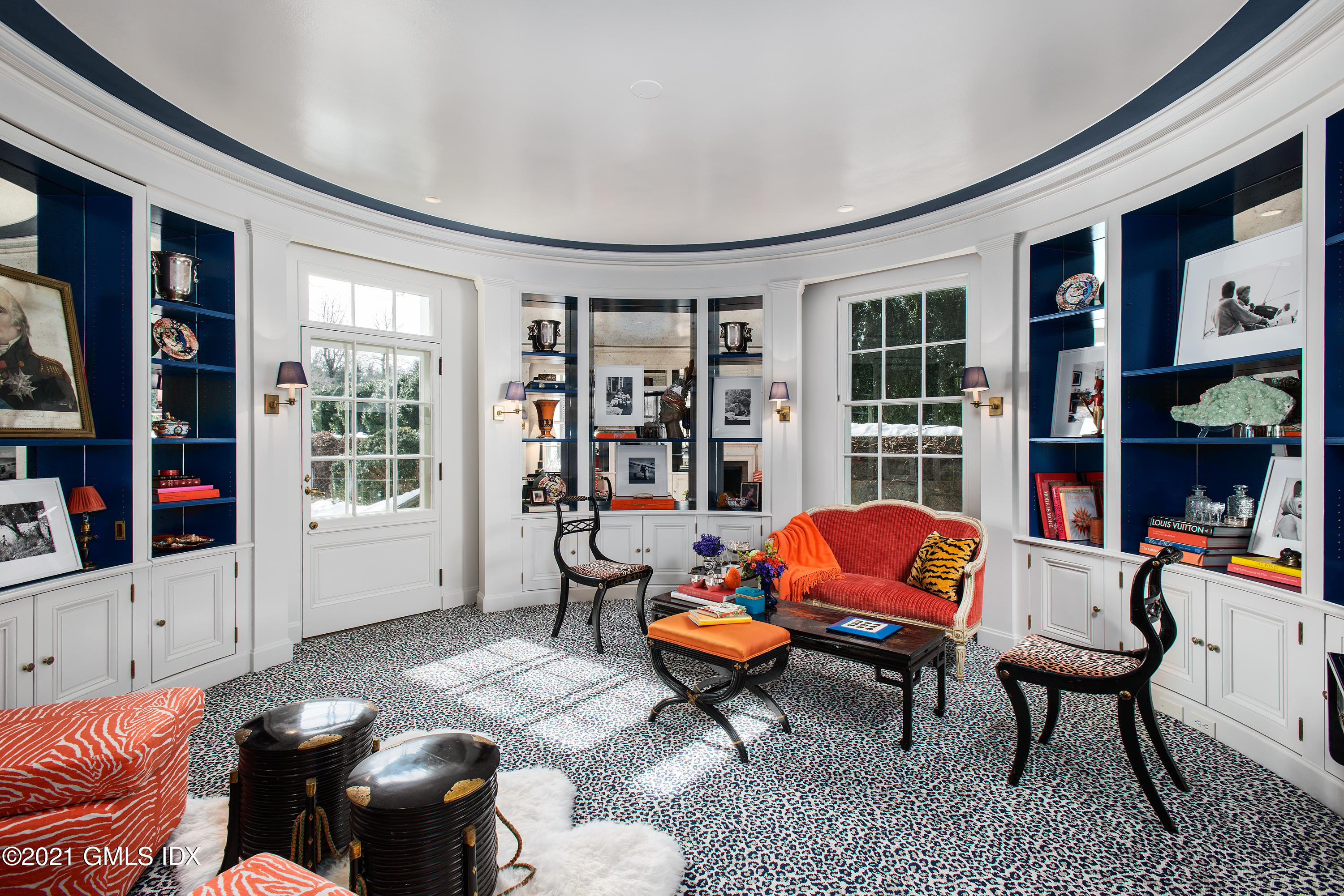 591 Riversville Road Greenwich, CT 06831 - Photo 14 of 79 a living room with furniture and book shelf
