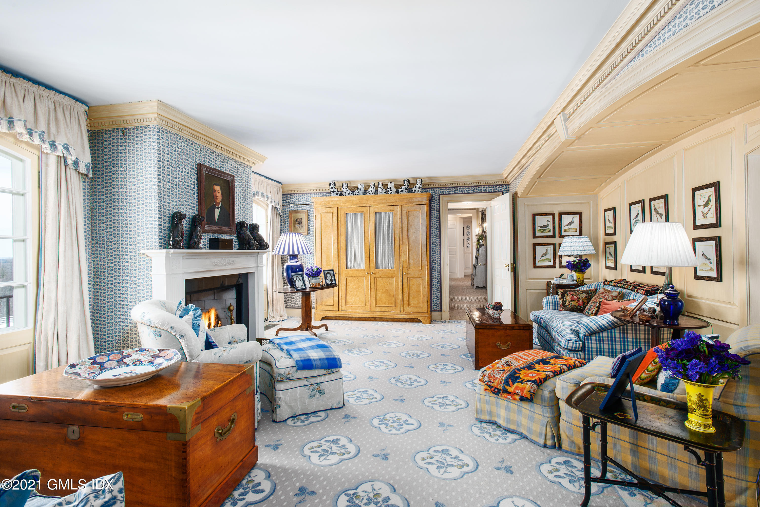 591 Riversville Road Greenwich, CT 06831 - Photo 21 of 79 a living room with furniture fireplace and a large window