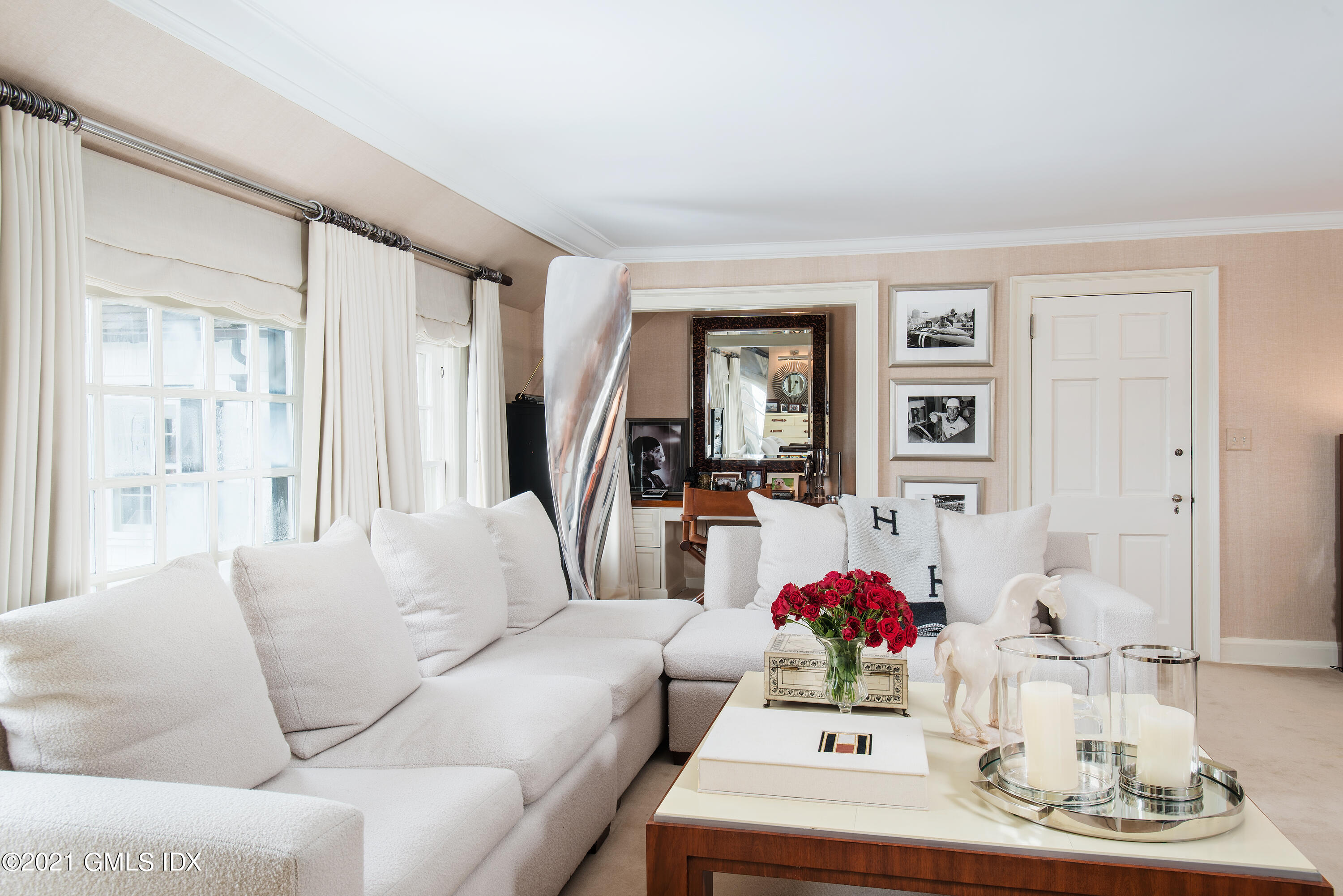 591 Riversville Road Greenwich, CT 06831 - Photo 29 of 79 a living room with furniture and a large window