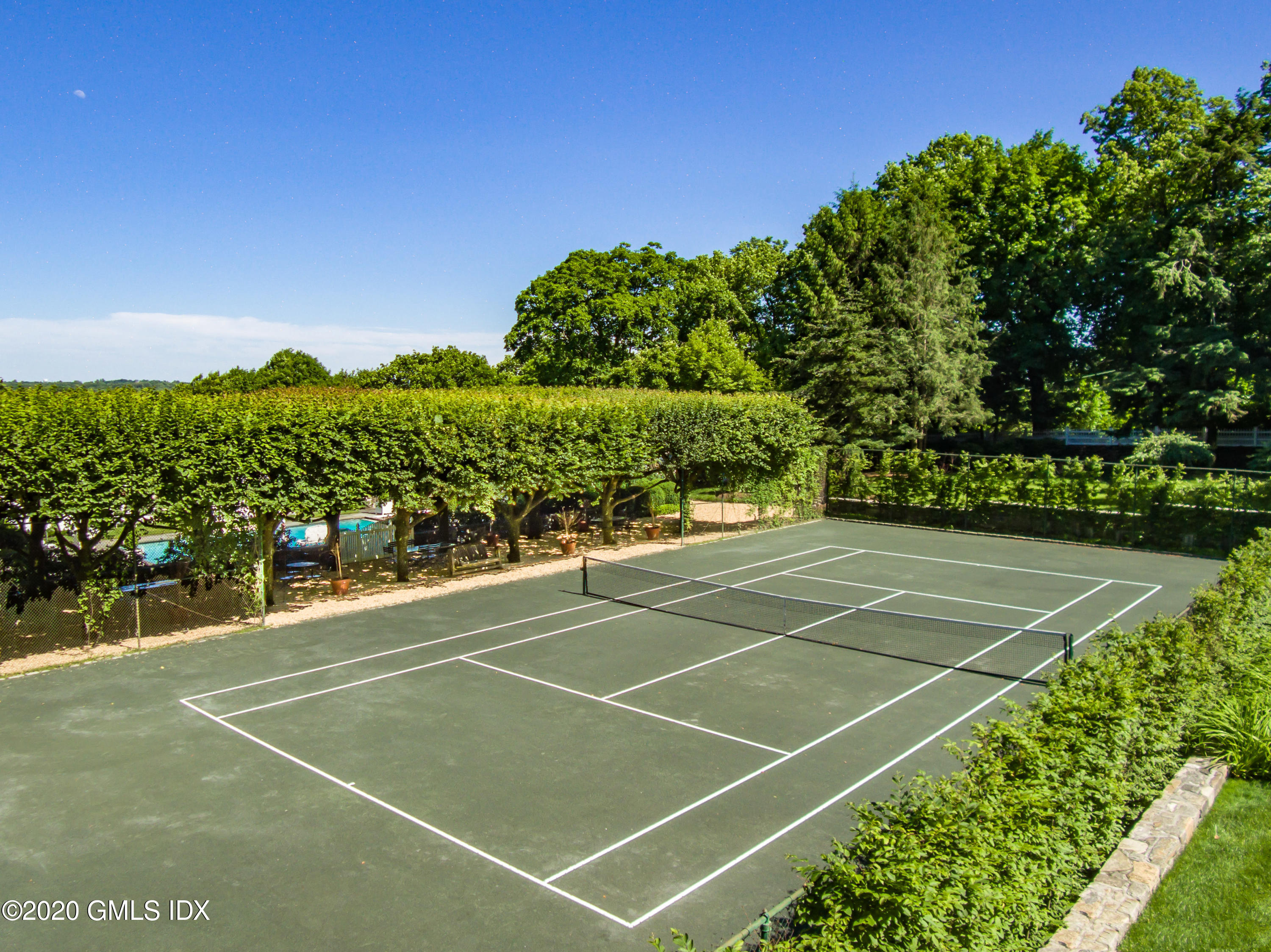 591 Riversville Road Greenwich, CT 06831 - Photo 45 of 79 a view of a tennis court