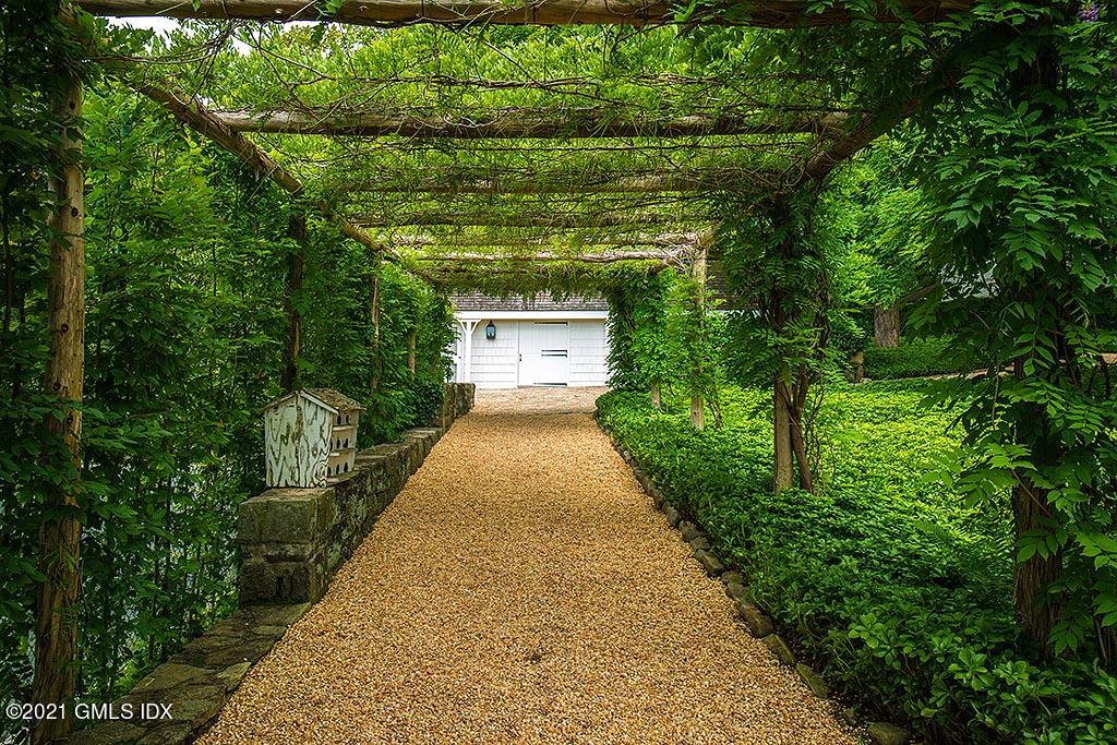591 Riversville Road Greenwich, CT 06831 - Photo 74 of 79 a view of a pathway both side of house