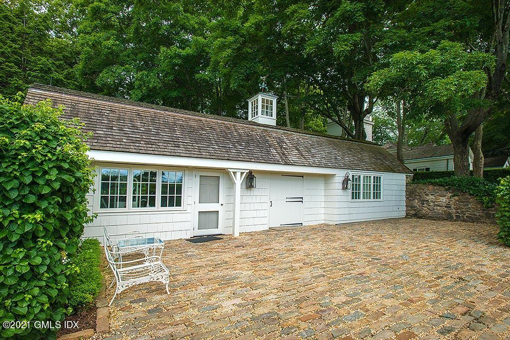 591 Riversville Road Greenwich, CT 06831 - Photo 75 of 79 a house view with a outdoor space