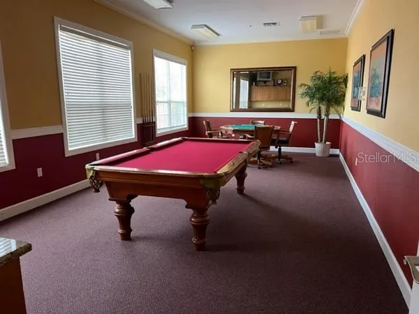 a room with furniture and window