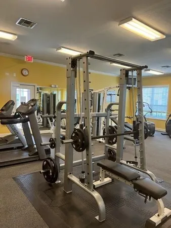 a view of a room with gym equipment