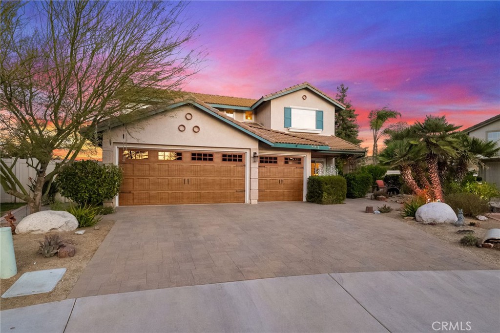 31782 Via San Carlos Temecula, CA 92592 - Photo 2 of 69 a view of a house with a yard and potted plants