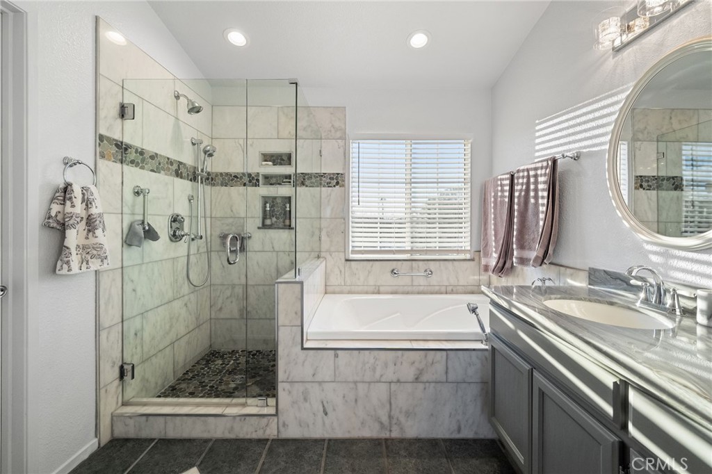 31782 Via San Carlos Temecula, CA 92592 - Photo 39 of 69 a bath room with a bath tub and shower