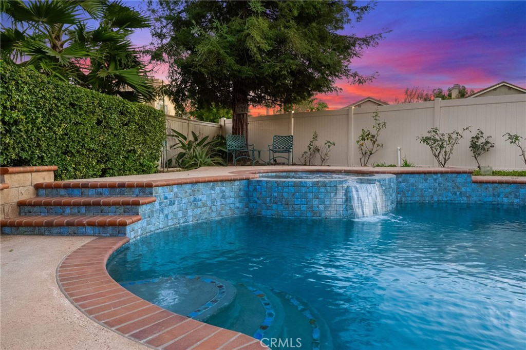 31782 Via San Carlos Temecula, CA 92592 - Photo 66 of 69 a view of a swimming pool with a yard