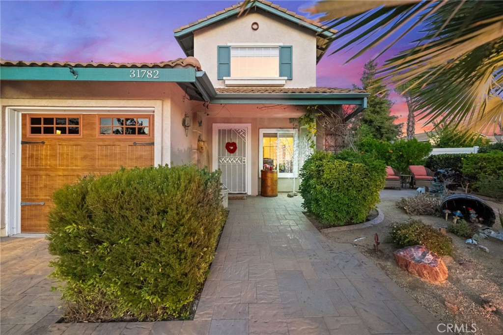 31782 Via San Carlos Temecula, CA 92592 - Photo 9 of 69 a front view of a house