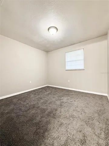 an empty room with a workbench