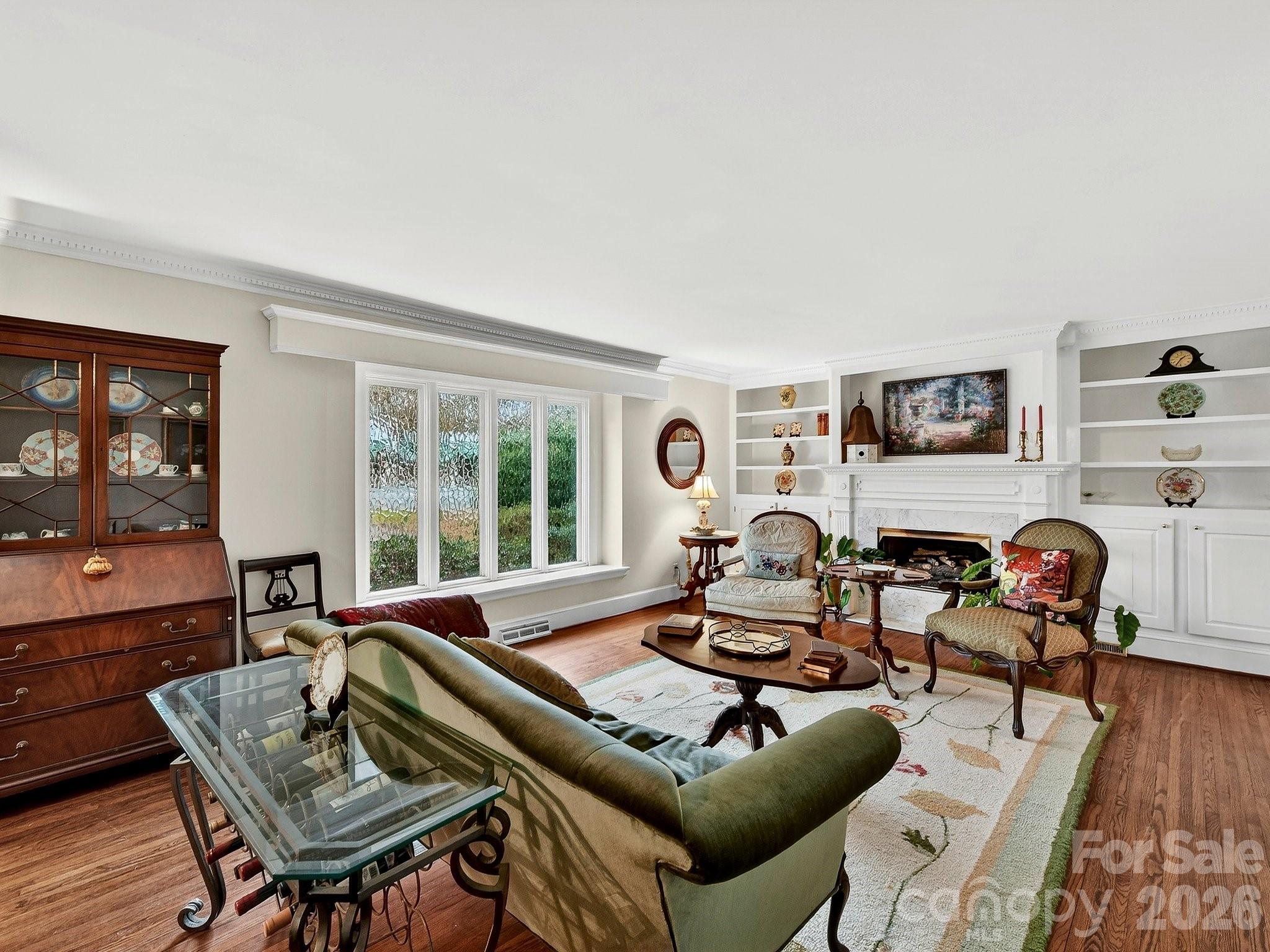 1535 Providence Road Charlotte, NC 28207 - Photo 19 of 42 a living room with furniture and a window