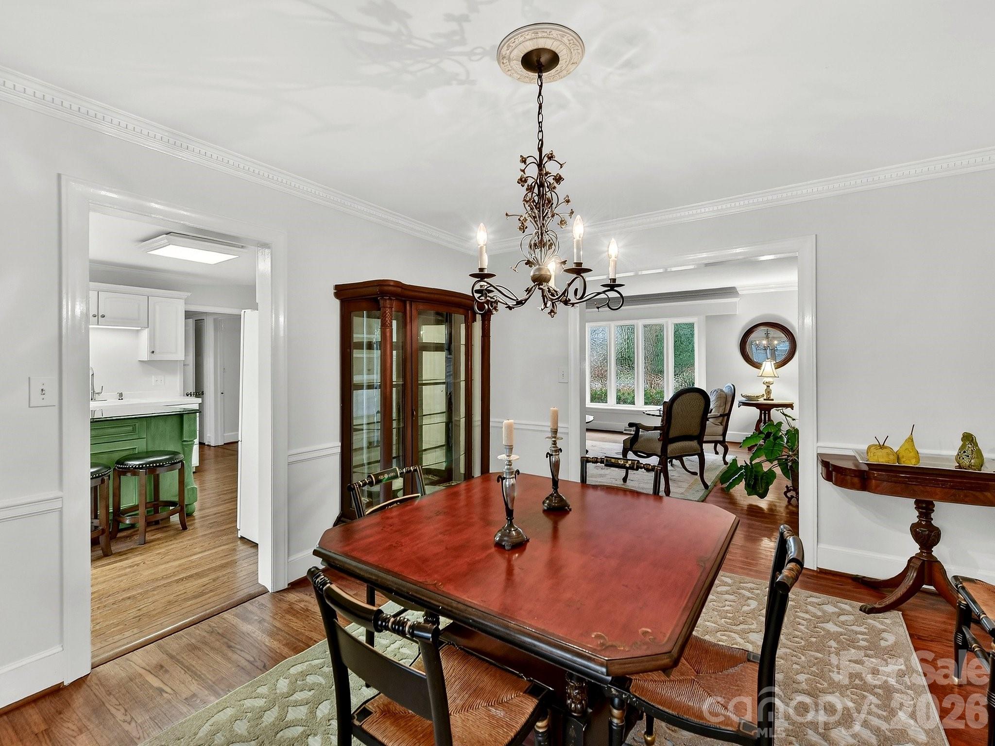 1535 Providence Road Charlotte, NC 28207 - Photo 20 of 42 a view of a dining room with furniture window and wooden floor