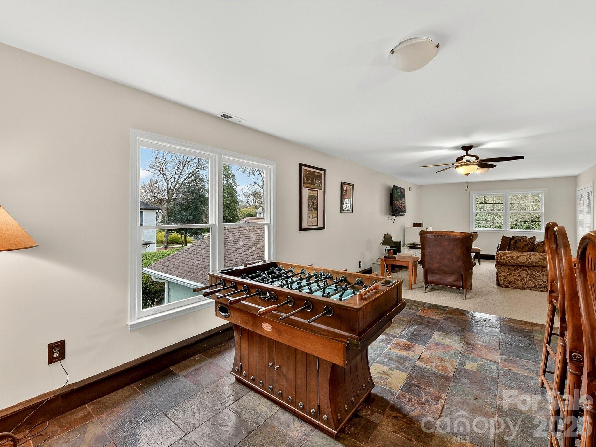 1535 Providence Road Charlotte, NC 28207 - Photo 27 of 42 a living room with furniture and a window