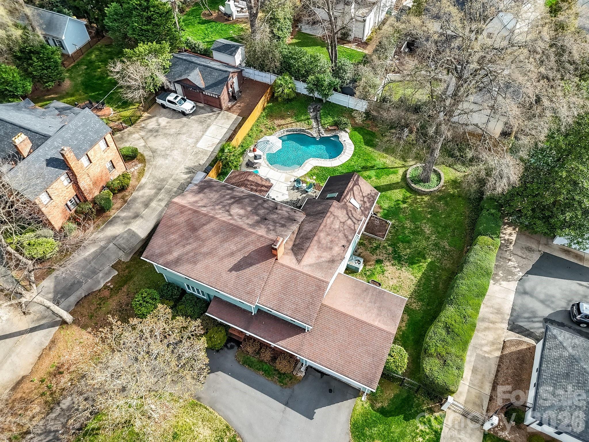 1535 Providence Road Charlotte, NC 28207 - Photo 38 of 42 an aerial view of a house with a swimming pool