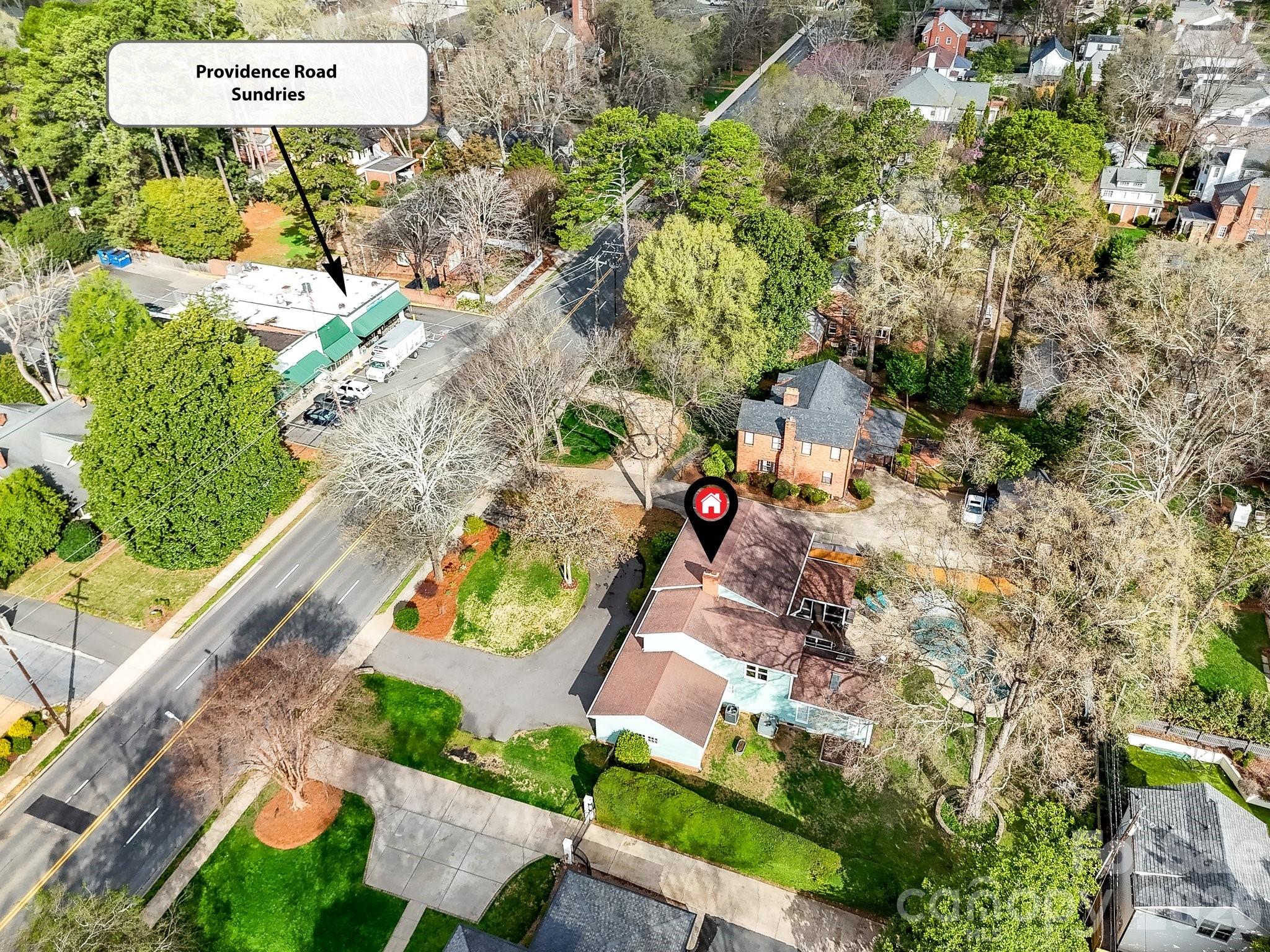 1535 Providence Road Charlotte, NC 28207 - Photo 40 of 42 an aerial view of a house with a yard and a garden
