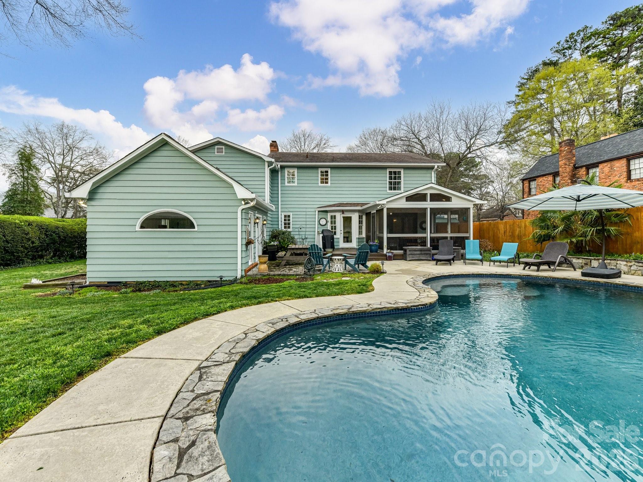 1535 Providence Road Charlotte, NC 28207 - Photo 10 of 42 an aerial view of a house with swimming pool and porch