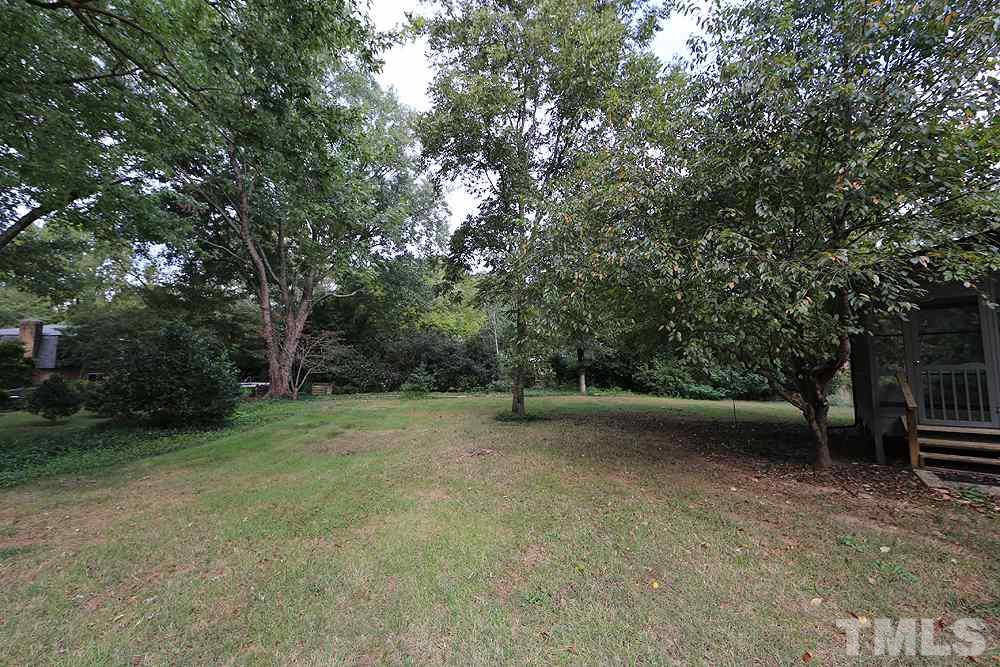 4008 Sherlock Court Raleigh, NC 27613 - Photo 22 of 25 a view of backyard with green space