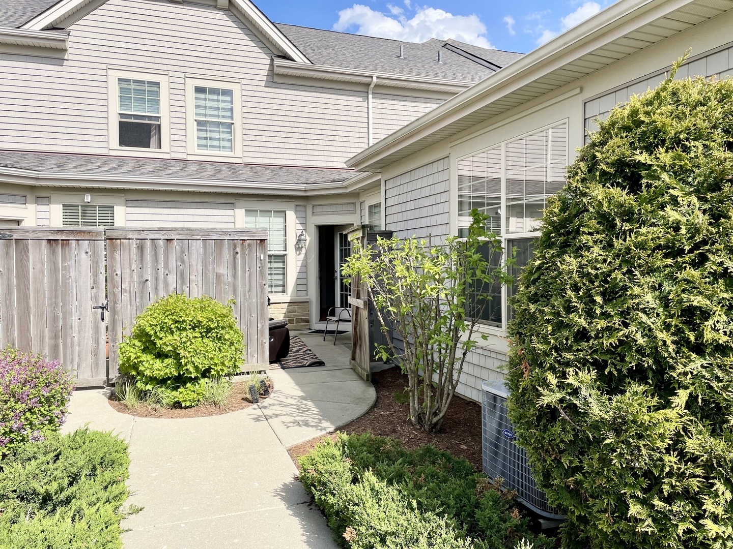 2018 Shermer Road, Unit 2018 Glenview, IL 60026 - Photo 38 of 39 a front view of a house with garden