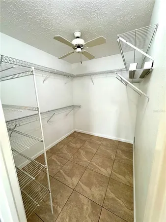 a bathroom with a window and a shower