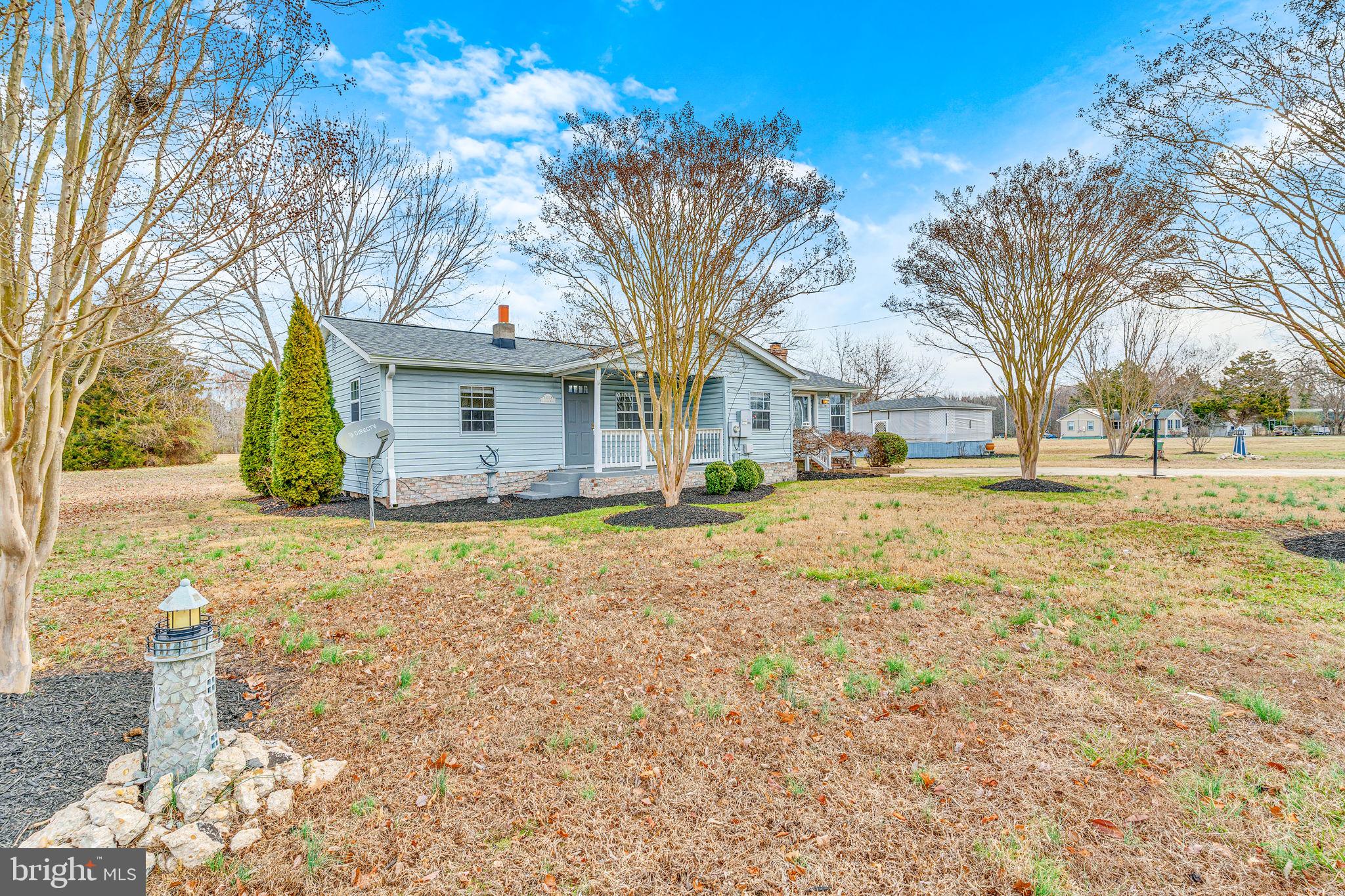24338 Longview Road Chaptico, MD 20621 - Photo 3 of 19 a front view of house with yard
